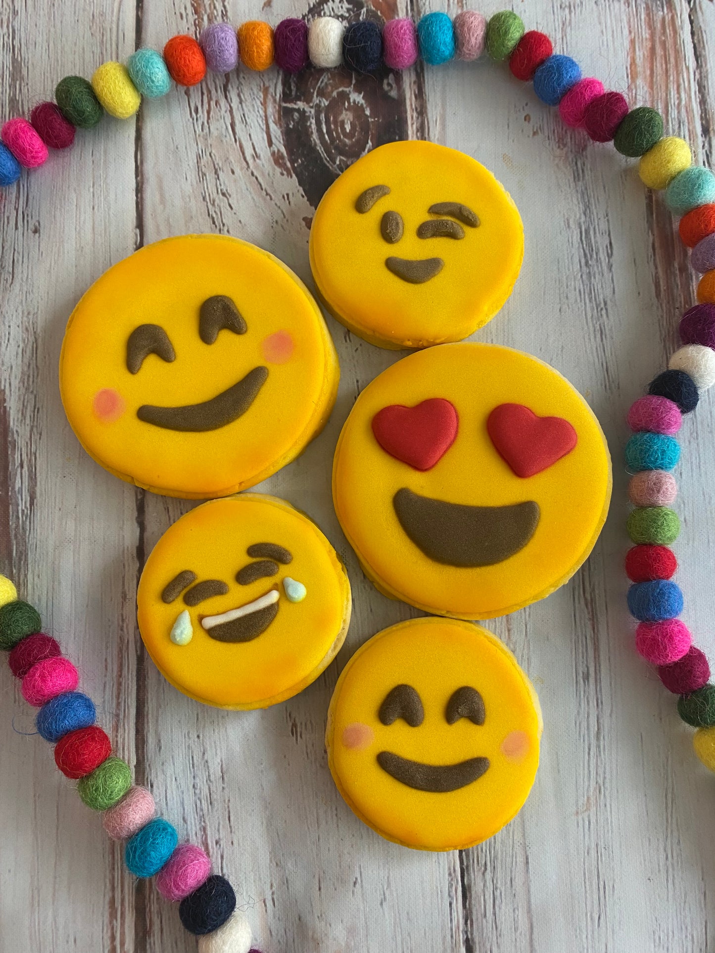 Dozen assorted emojis