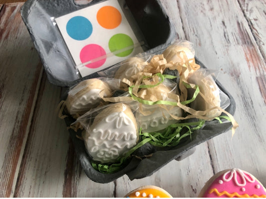 Egg carton filled with half a dozen paint an egg cookies